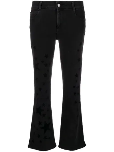 Stella Mccartney Star Print Kick-flare Jeans In Black