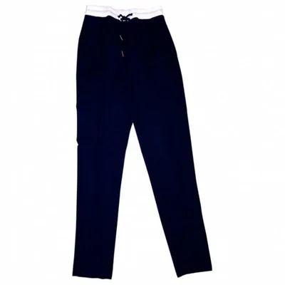 Pre-owned Sandro Wool Carrot Pants In Black