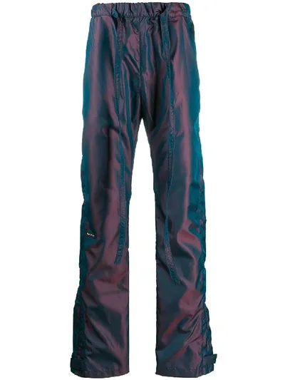 Fear Of God Holographic Track Pants In Blue