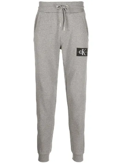 Calvin Klein Jeans Est.1978 Logo-patch Tapered Track Pants In Grey