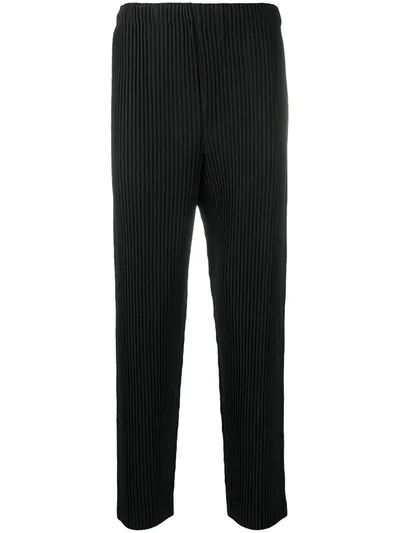 Issey Miyake Pleated Tapered-leg Trousers In Black