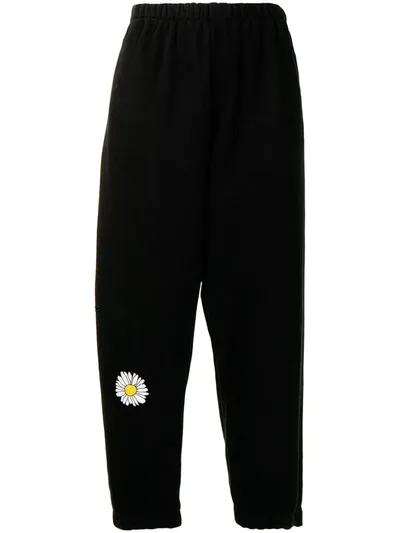 Natasha Zinko Daisy-print Distressed Cotton-blend Sweatpants In Black