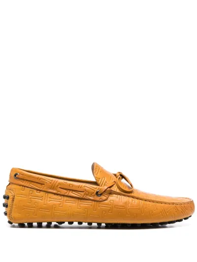 Tod's Gommino Embossed Loafers In Yellow