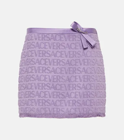 Versace X Dua Lipa Logo-jacquard Miniskirt In Purple