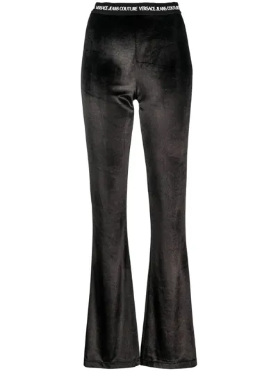 Versace Jeans Couture Logo Waistband Flared Trousers In Black