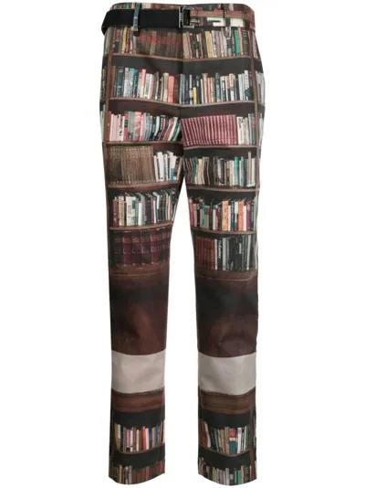 Sacai X Interstellar Straight-leg Trousers In Brown