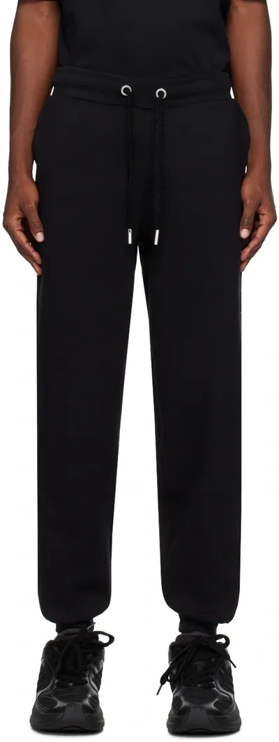 Ami Alexandre Mattiussi Logo-patch Drawstring Track Pants In Schwarz