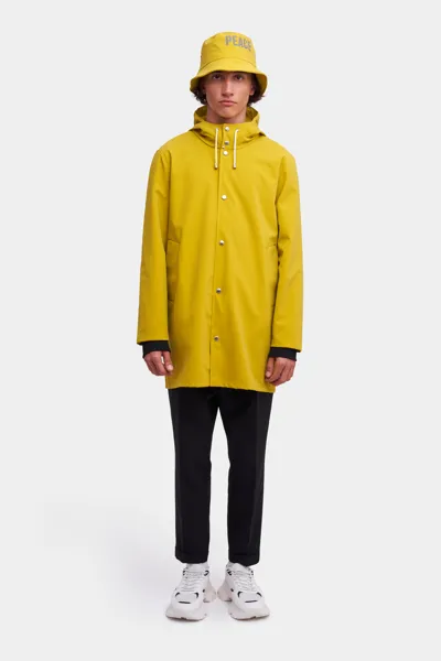 Stutterheim Stockholm Lightweight Matte Raincoat Gold In Golden Palm