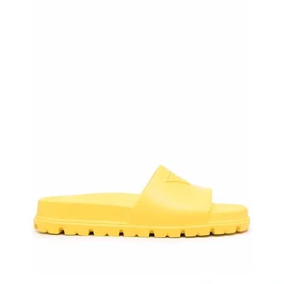 Prada Men's Triangle Logo Rubber Slides In Yellow