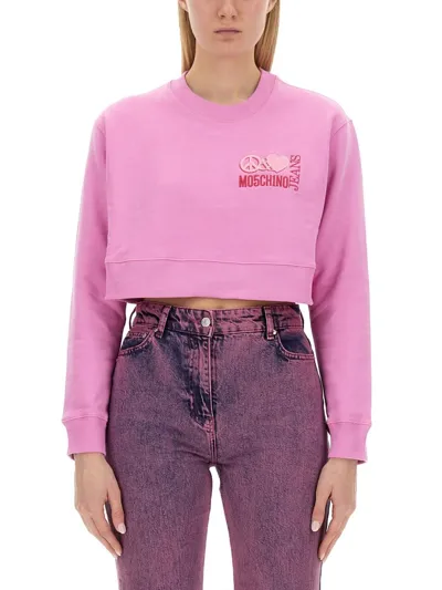 Moschino Logo Printed Crewneck Cropped Sweatshirt In Pink