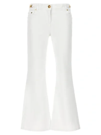 Versace Logo Denim Flared Jeans In White