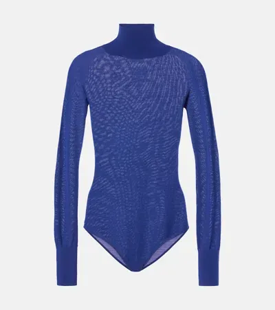 Alaïa Sheer Turtleneck Wool Bodysuit In Blue