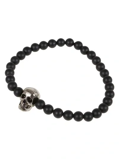 Alexander Mcqueen Skull Charm Bracelet In Black