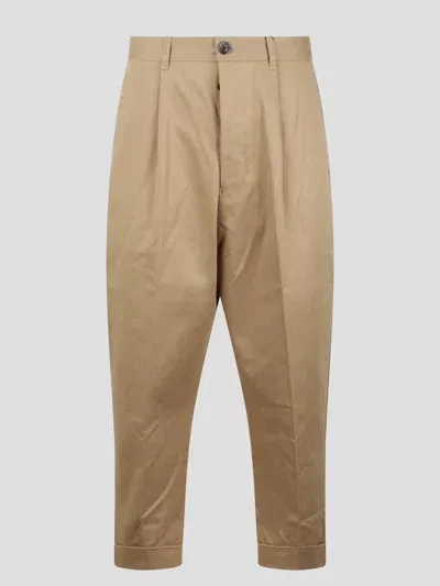 Ami Alexandre Mattiussi Carrot Oversized Trousers In Brown