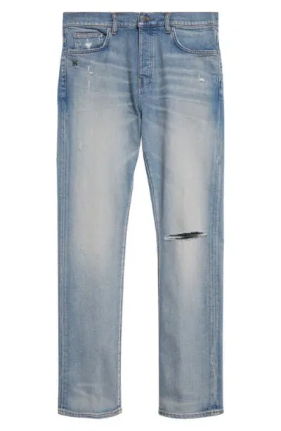 Amiri Slash Ripped Slim Fit Jeans In Blue