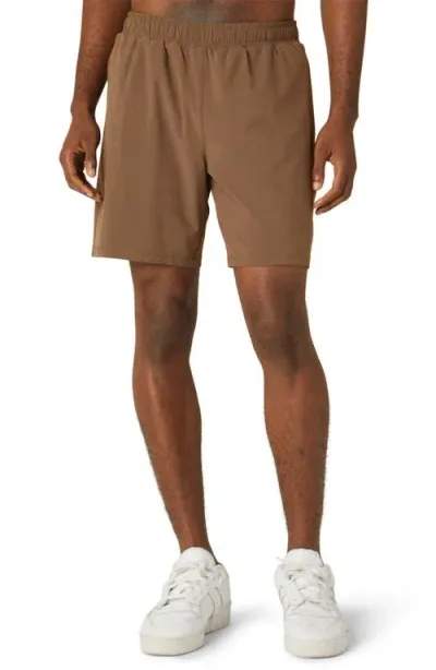 Beyond Yoga Pivotal Performance Shorts In Deep Tan