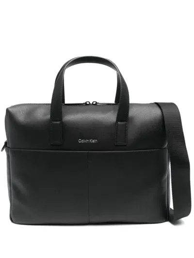 Calvin Klein Embossed-logo Holdall In Black