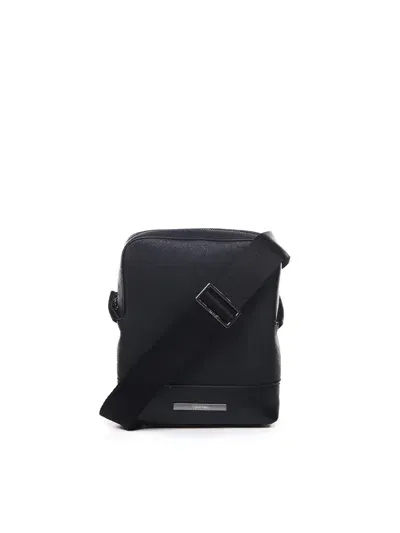 Calvin Klein Logo-plaque Cross Body Bag In Black