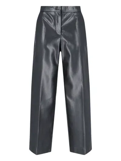 Calvin Klein Faux Leather Mid Rise Trousers In Black