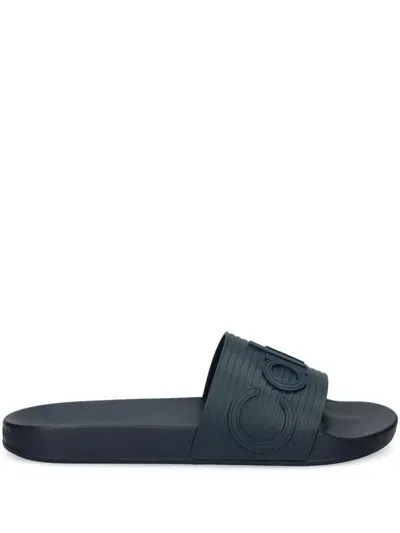 Calvin Klein Raised-logo Slides In Blue