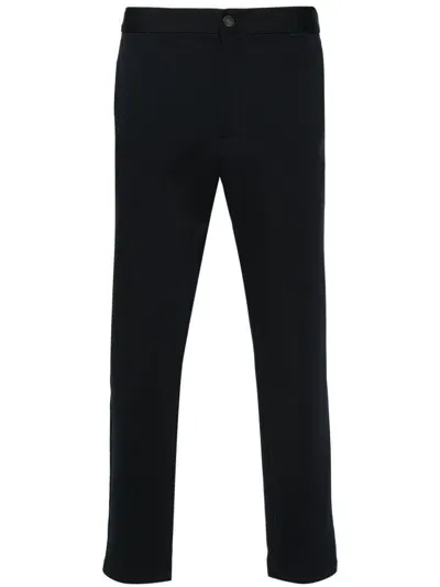 Calvin Klein Logo Tag Tapered-leg Trousers In Blue