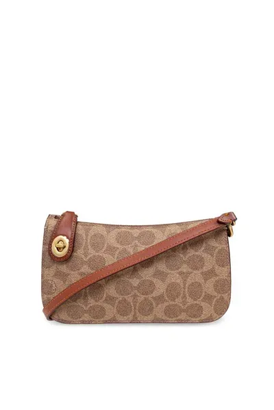 Coach Penn Monogrammed Shoulder Bag In Brown