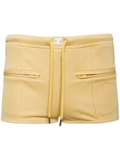 Courrèges Interlock Tracksuit Mini Shorts In Yellow