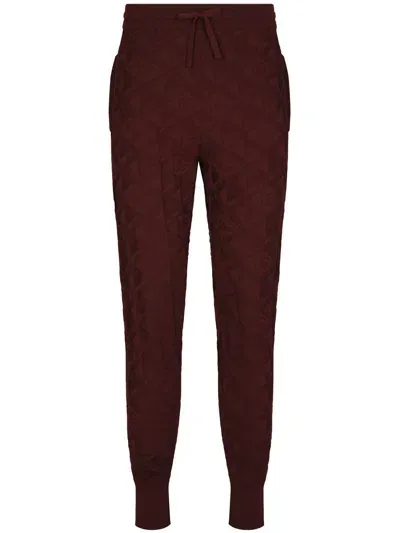 Dolce & Gabbana All-over Logo Track Pants In Red