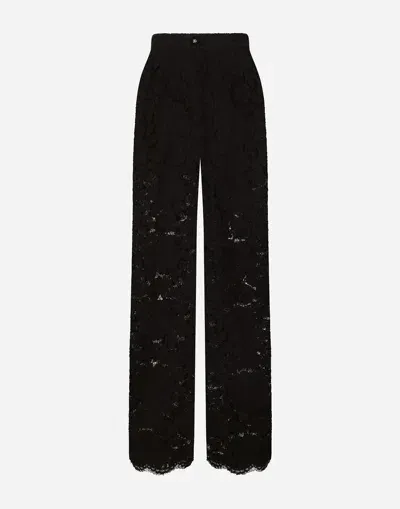 Dolce & Gabbana Flared Floral Cordonetto Lace Pants With Dg Logo In Black