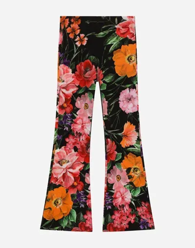 Dolce & Gabbana Jersey Pants With Rose Print Over A Black Background In Multi