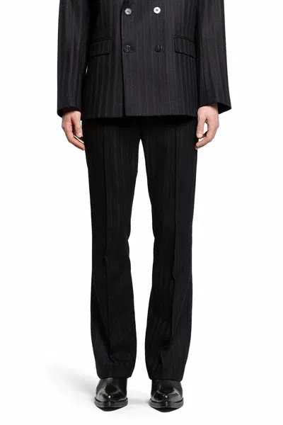 Ernest W Baker Man Black Trousers