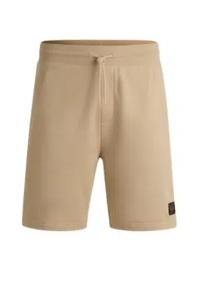 Hugo Cotton-terry Relaxed-fit Shorts With Logo Trim In Beige