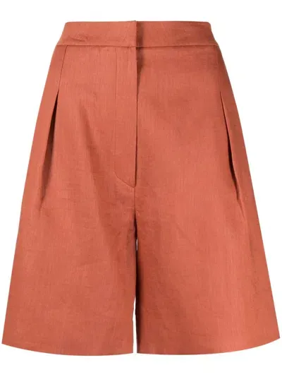 In The Mood For Love Pressed-crease Linen Shorts In Orange