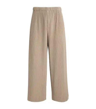 Issey Miyake Pleated Wide-leg Trousers In Beige