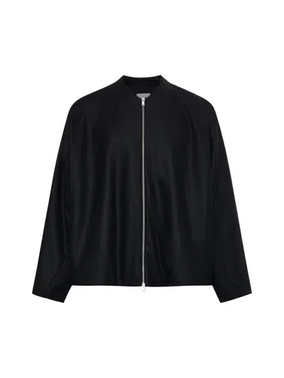 Jil Sander Coats In Black