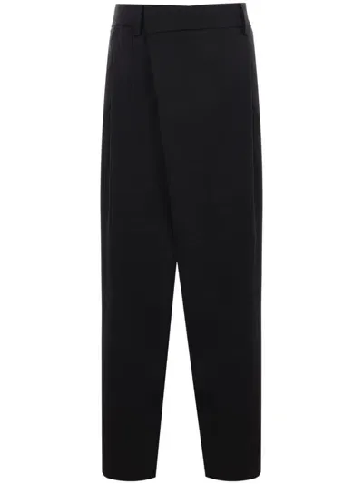 Juunj Asymmetric Tailored Wool Trousers In Black