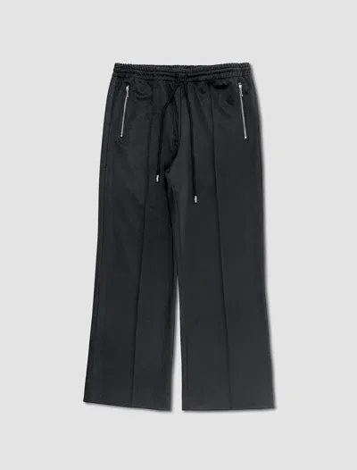 Jw Anderson Bootcut Track Pants In Nero