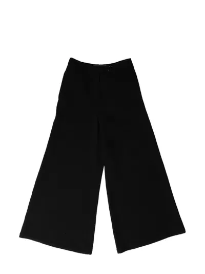 Kimhēkim Kiminte Trousers In Black