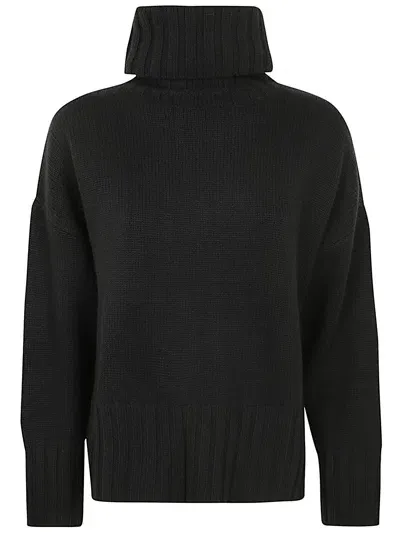 Kujten Yoko Turtle Neck Sweater In Black