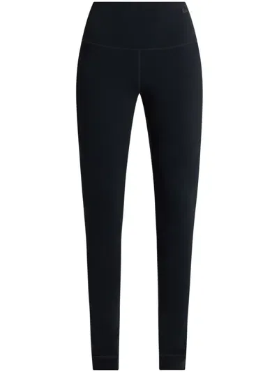 Lacoste Logo-appliqué Tapered Leggings In Black