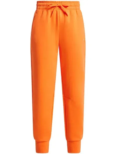 Lacoste Tapered Track Pants In Orange