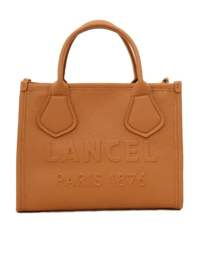 Lancel Hand Held Bag. In Brown