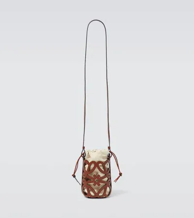 Loewe Anagram Leather-trimmed Canvas Bucket Bag In Brown