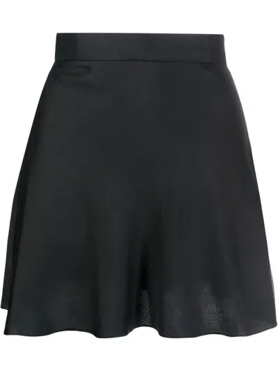 Manurí Flared Silk Mini Skirt In Black