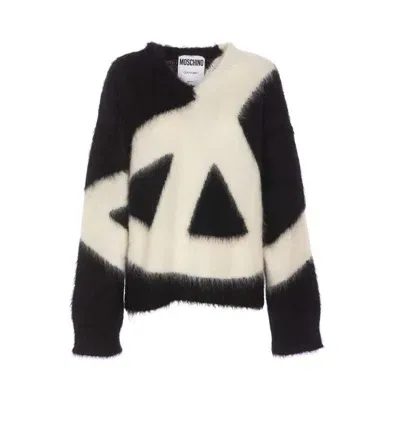 Moschino Sweaters In Black