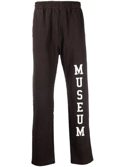 Museum Of Peace And Quiet Logo-print Cotton Pants In Brown