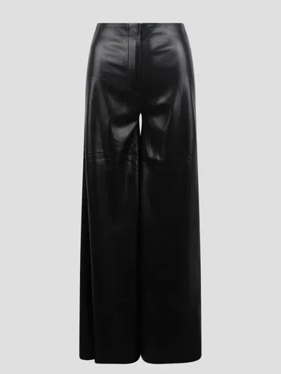 Nanushka Flared Faux-leather Trousers In Black