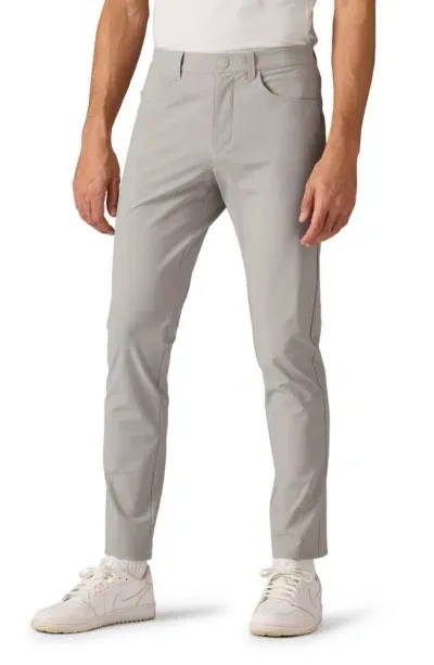 Rhone Momentum Water Repellent Flat Front Golf Pants In Fossil Grey