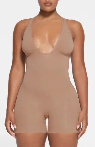 Skims Seamless Sculpt Plunge Mid Thigh Bodysuit In Sienna