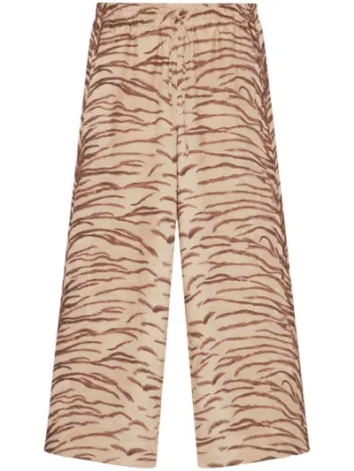 Stella Mccartney Tiger-print Organic Silk Trousers In Beige